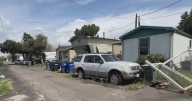 Trash, abandoned property line Ceres mobile home park despite power restoration