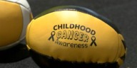 iJag students rally to raise awareness for childhood cancer with “Gold Out” football game