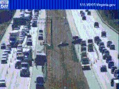 Vehicle crash involving tractor-trailer causes delays near Fort Eustis Blvd.