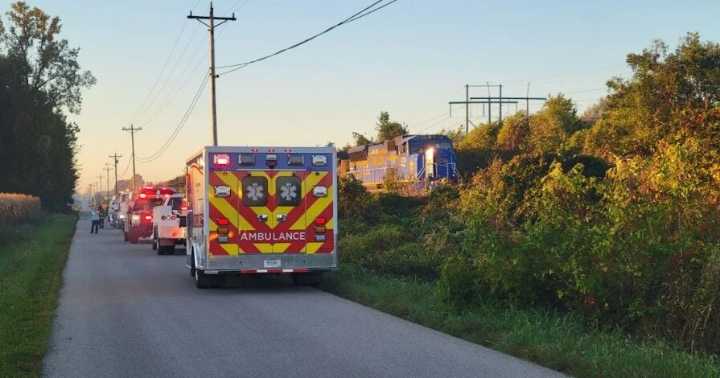 Father and son killed after vehicle hit by train in Henderson County