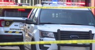 Woman dies after being shot inside South Side barber shop