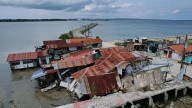 Matmo weakens into a storm after blowing across northern Philippines