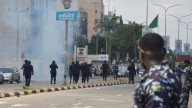 Nigeria's president replaces top security officials as he struggles to restore stability