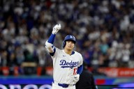 Ohtani stars as Dodgers sweep Brewers to reach World Series