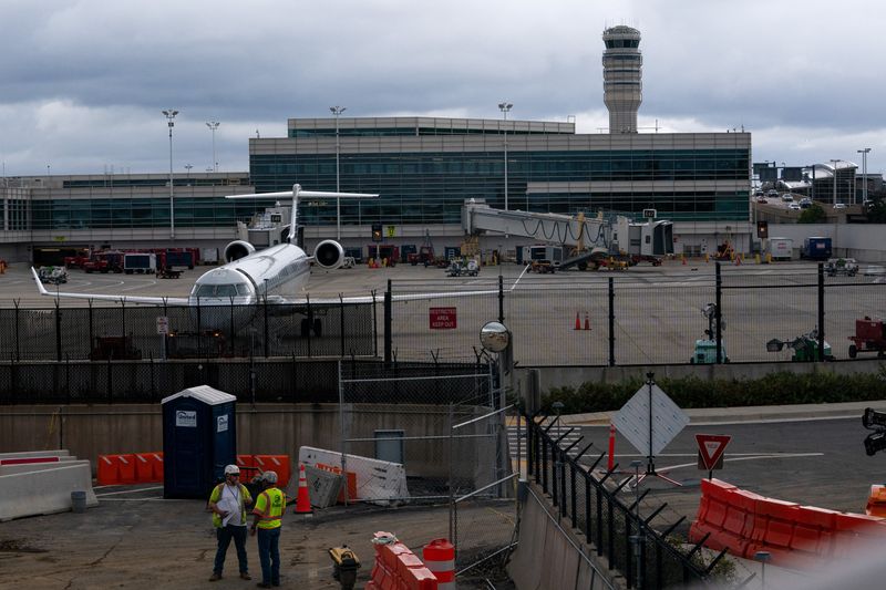 US could dismiss air traffic controllers who fail to work during shutdown, transportation secretary says